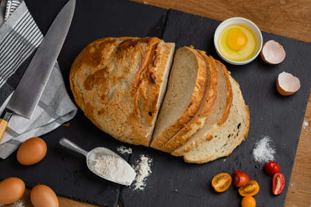 Bakery - gold rustic crusty loaves of bread. Still life captured from above (top view, flat...