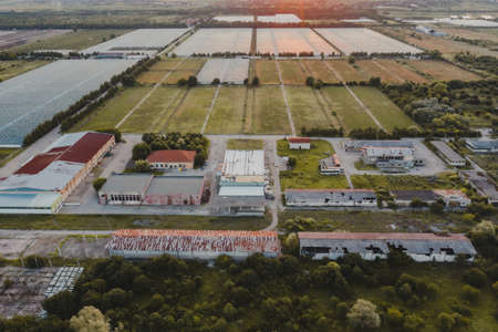 Aerial view, halls and vegetable warehouses in the field.の写真素材