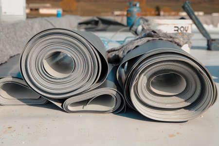 Roofing PVC membrane in rolls placed on the roof of the siteの写真素材