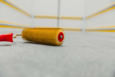 Selective focusing on the roll of bubble needles on the polished cement floorの写真素材