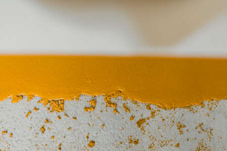 Selective focus on the yellow floor of freshly applied epoxy mortar system