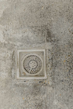 water drain in the concrete floorの写真素材