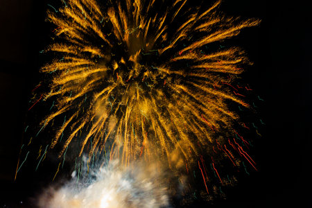 Colorful fireworks over the city at night - great for wallpapersの写真素材