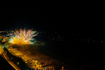 Wide angle shot of bright fireworks at night - great for wallpapers and backgroundsの写真素材