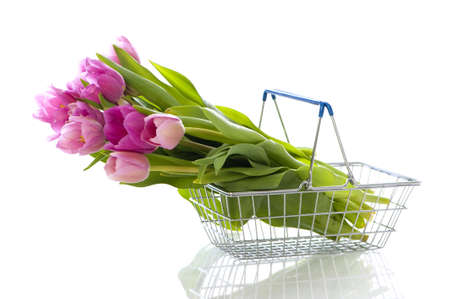 Flowers in shopping basketの写真素材