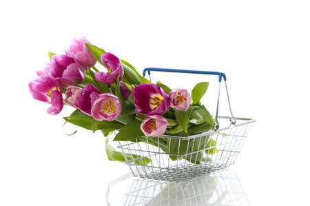 Flowers in shopping basketの写真素材