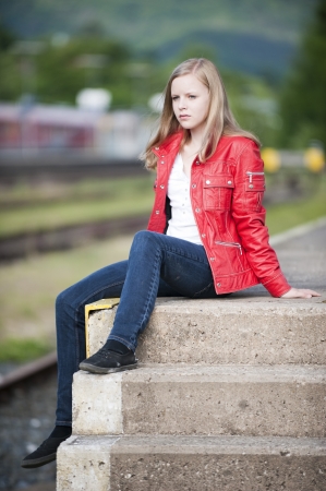 Young girl at the stationの写真素材