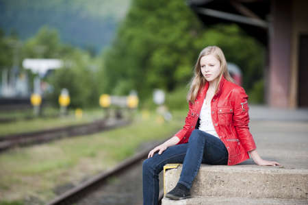 Young girl at the stationの写真素材