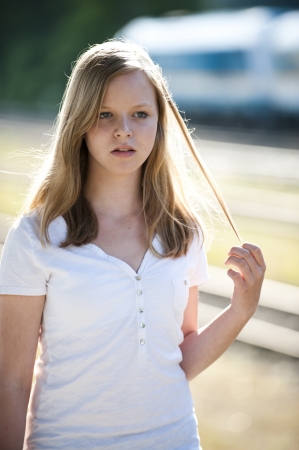 Young girl at the stationの写真素材