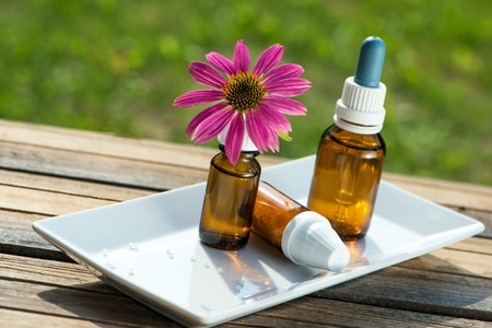 Alternative medicin with echinacea blossomの写真素材