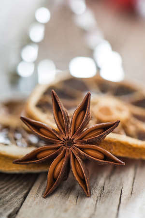 Christmas spices on wooden backgroundの写真素材