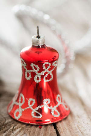 Christmas bell on wooden backgroundの写真素材