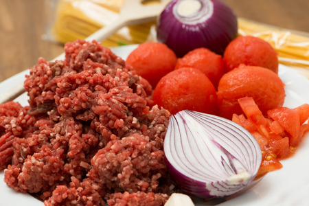 Spaghetti bolognaise ingredients on a plate