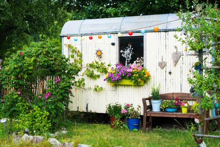 Old wooden shed in a gardenの写真素材