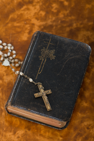 Old bible with crucifixの写真素材
