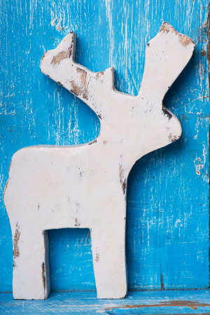 Wooden deer on wooden backgroundの写真素材