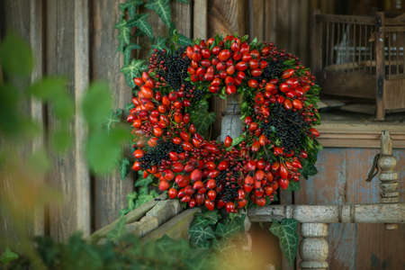 Wreath with many rose hipsの写真素材