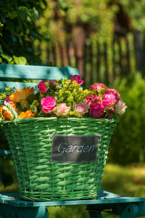 Colorful flowers in a basketの写真素材