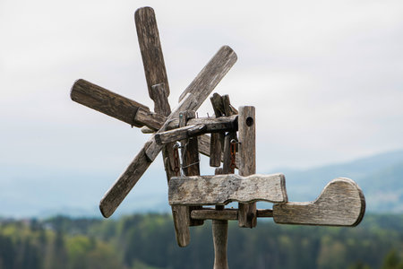 Wooden klapotez in western styria on the background of the mountains. Selective focus.の写真素材