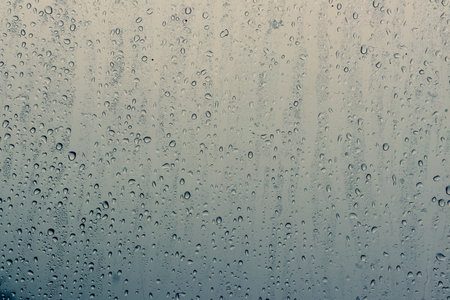 Water drops on the glass. Raindrops on the window. Background.の写真素材
