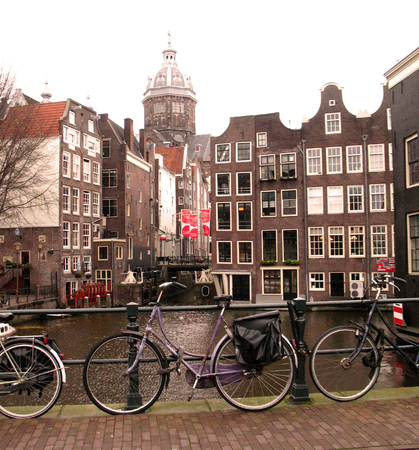 Bicycle Parking in Amsterdam, Dutch houses near waterの写真素材