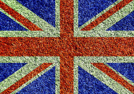 Britain, the flag on the texture of the grassの写真素材