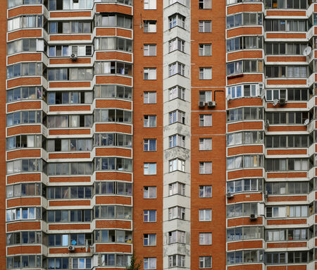 Big house, city life, windows and balconiesの写真素材