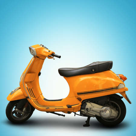 Yellow retro scooter on a blue backgroundの写真素材