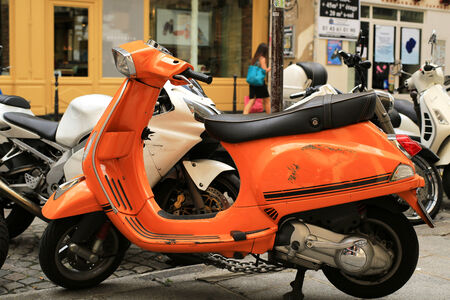 Scooter stand in line at the city Parkの写真素材