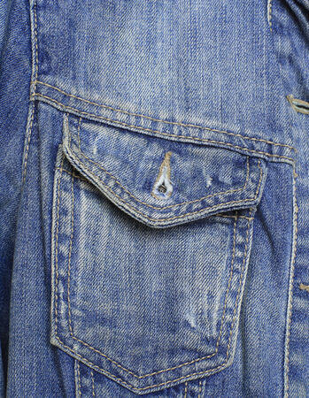 Open pocket blue denim jacket with seamsの写真素材