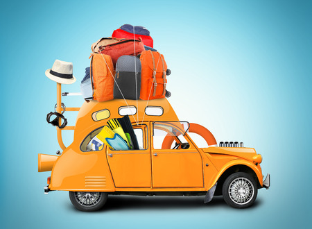 Summer, vintage cars with fins on the beachの写真素材