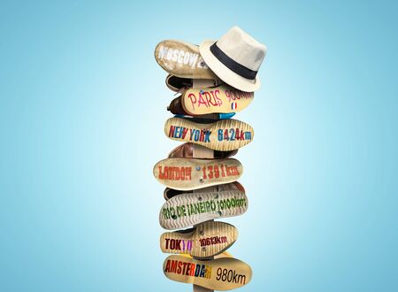 Signpost made of Shoe soles with citiesの写真素材