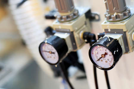 Dial meter on industrial equipmentの写真素材