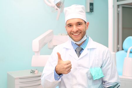 Doctor dentist after work in medical officeの写真素材