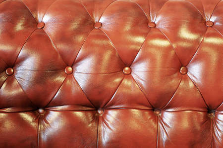 Leather background with flashing light, vintage sofaの写真素材