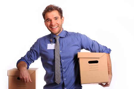 Young male worker of the delivery service in the blue shirtの写真素材