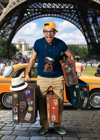 Tourist on vacation with a luggage in Parisの写真素材