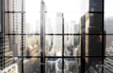 Large panoramic window with views of the cityの写真素材