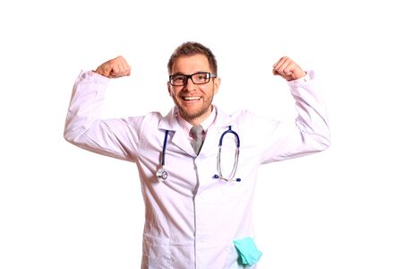 Young doctor in glasses with arms raisedの写真素材