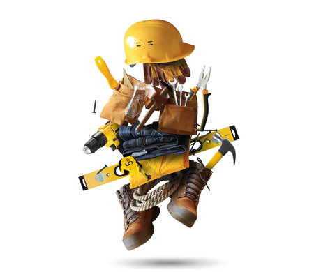 Construction tools with a shoes and a helmetの写真素材