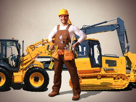 Builder in yellow helmet, protective glasses and working clothesの写真素材