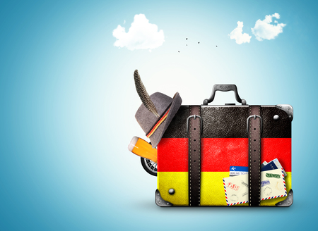 Germany, vintage suitcase with German flagの写真素材