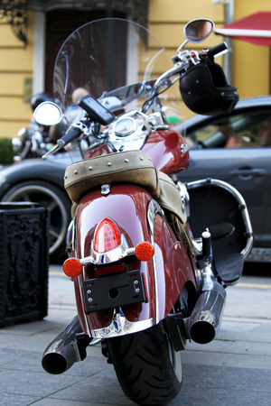 Old vintage motorcycle with chrome accents and a headlampの写真素材