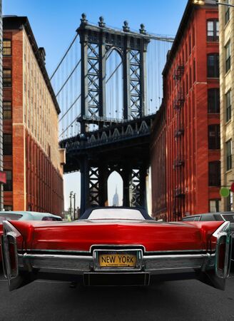 Retro old car red color on the road in New Yorkの写真素材