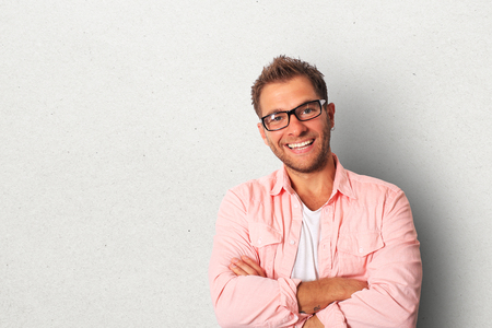 Young man in light shirt and glassesの写真素材