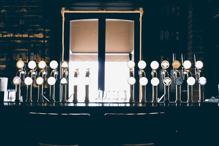 Classic bar with bar counter and beer tapsの写真素材
