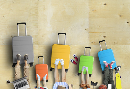 Five colored suitcases for holidaysの写真素材