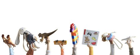 Children hands holding toys, concept of the childhoodの写真素材