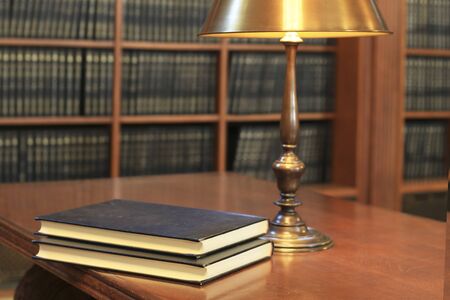 Books are on the table in the libraryの写真素材