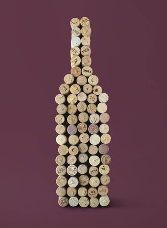 A bottle of wine made up of wine corksの写真素材